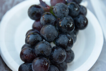 View of the ripe grapes on the dish