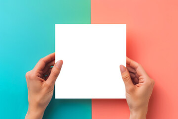Hand Holding a Blank white Square Card for Mockups on blue and pink pastel Background