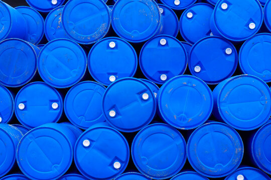 The stack of blue plastic oil drums formed a beautiful pattern