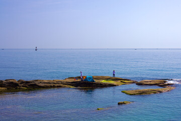 Fishers Casting Lines off Ayajin Port Coast