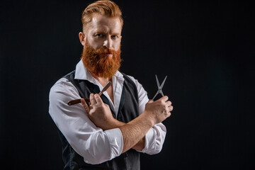Man hairdressing and barbering. Hairdresser at barbershop isolated on black. Hairdresser man....