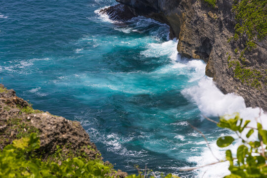 ocean and waves hitting the rocks, sea foam, beautiful landscape