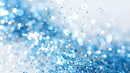 Fototapeta premium A blue and white background with a lot of blue and white specks. The blue specks are scattered all over the background, creating a sense of movement and energy