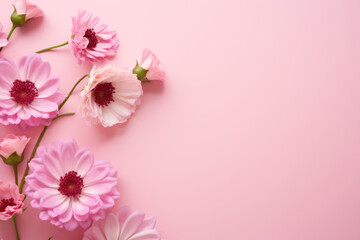 A pink background with flowers on it