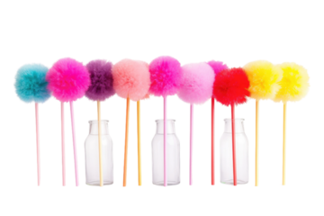 Row of Different Colored Pom Poms. On a White or Clear Surface PNG Transparent Background..