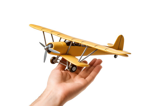 Hand Holding Toy Airplane. On a White or Clear Surface PNG Transparent Background..