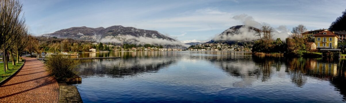 Panorama picture of Lake Lugano between Caslano and Lavena Ponte Tresa.