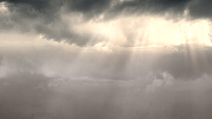 View of dark cloudscapes with sunlight