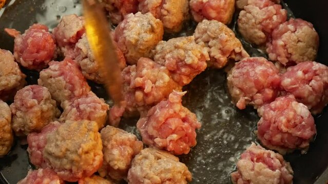 Cooking meat on a skewer close-up
