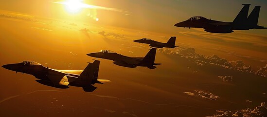 fighter planes are flying at sunset