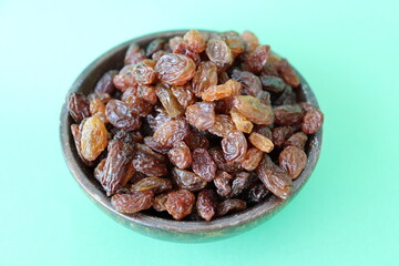 raisins are displayed in traditional and glass containers