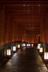 Tuinposter Red torii gate of the shrine at night © SK