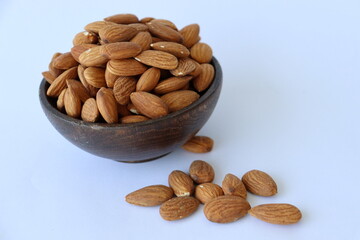 Almonds are displayed in traditional and glass containers