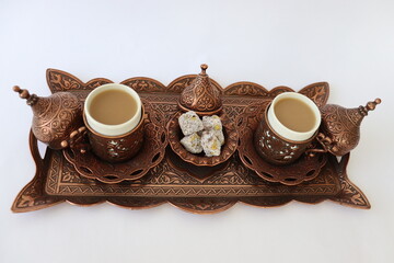 Turkish Coffee consept table, Turkish coffee brewing process and elderflower syrup.