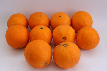 Fresh ripe oranges as background, top view