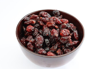 Dried black grape berry Jumbo, close-up with white background