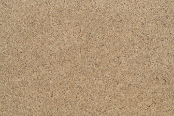 Chipboard background texture closeup. sawdust board