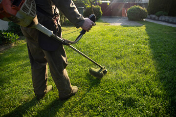 Lawn mover on green grass. Machine for cutting lawns.