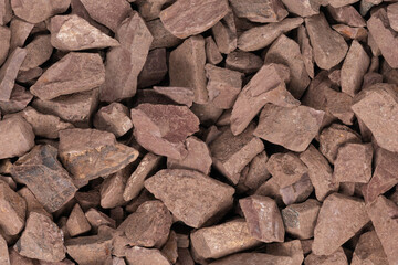 crushed stone crumb background texture close-up. rubble in a heap. natural decorative primer for designers. fraction