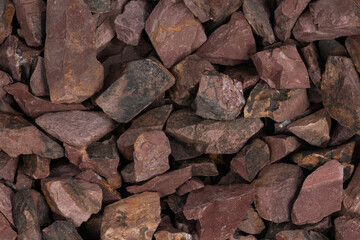crushed stone crumb background texture close-up. rubble in a heap. natural decorative primer for designers. fraction
