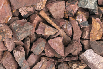 crushed stone crumb background texture close-up. rubble in a heap. natural decorative primer for designers. fraction