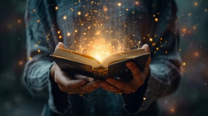 Young man reading magic book in dark forest with lights and stars concept