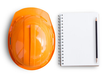 Top view with orange safety engineer helmet and blank notebook or notepad and pencil on white...