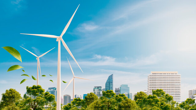Green technology. the future concept of sustainable energy. wind turbine, wind energy for smart city. leaf blowing in the air.