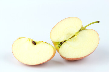 Whole red apple fruit with slice (cut) isolated on white background.