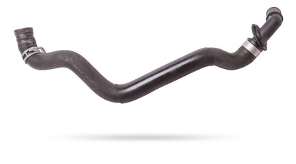 Black plastic hose of the car engine cooling system on a white isolated background in a photo...