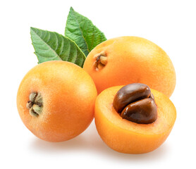 Ripe perfect loquat fruits with green leaves isolated on white background.