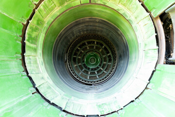 Military aircraft jet engine nozzle. View from the back. The insides.