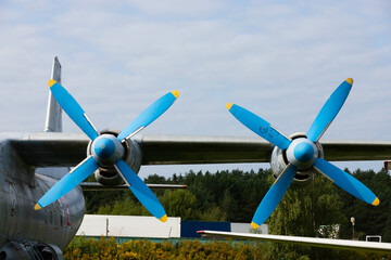 Wing and propellers of a civilian old aircraft.