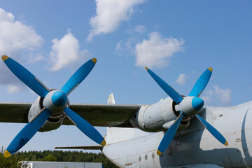 Wing and propellers of a civilian old aircraft.