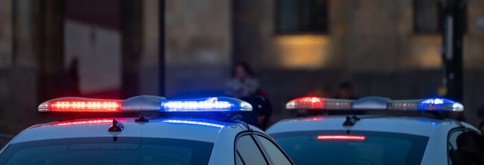 Police car in evening traffic