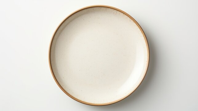 A simple white plate with a brown rim on a white surface. Perfect for food and kitchen-related projects