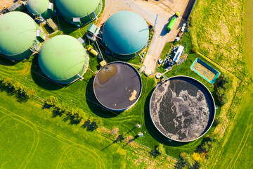 Biogas plant and farm in fields. Renewable energy from biomass. Agriculture prepared for Green Deal. Aerial view to Czech industry. Sustainable development in European Union.  - 763060821