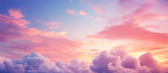 A breathtaking natural landscape at dusk, with pink and purple clouds filling the sky, creating a stunning afterglow in shades of violet