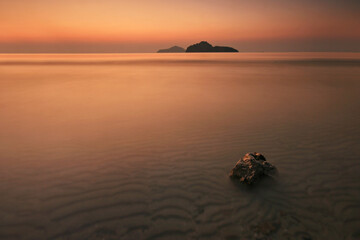 Sun rise at Manow Beach Famous tourist attractions of (Wing 5) Military Base in Prachuap khiri khan...
