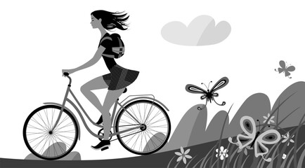 A girl with loose hair in a short skirt with a backpack rides a bicycle among a summer landscape with decorative flowers and butterflies. Cartoon flat 
drawing in gray tones. Vector illustration