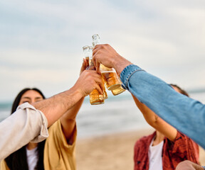 fun beach summer youth friend young friendship beer drink alcohol cheer happiness woman group beverage toast holiday bottle vacation sea - 763074275
