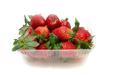 ripe red strawberries on a white background - 763094836