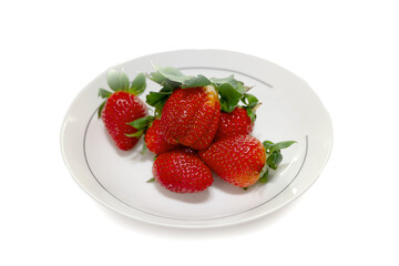 ripe red strawberries on a white background - 763095020