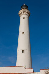 the white lighthouse tower of San Vito lo Capo.
