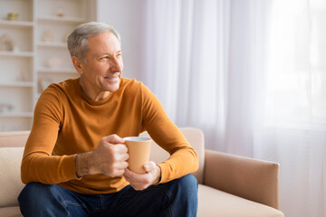 Senior man relaxing with a cup of coffee - obrazy, fototapety, plakaty