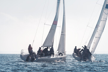 Racing sailboats compete during Sailing regatta in Mediterranean