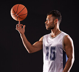 Man, basketball playing and finger or sports game in studio or professional exercise, athlete or...
