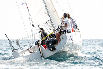 Sailing boat in light wind during regatta competition