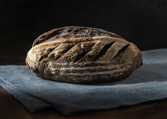 Homemade sourdough bread. Fresh Sourdough bread on a black background.