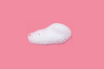 Foam of soap on pink background